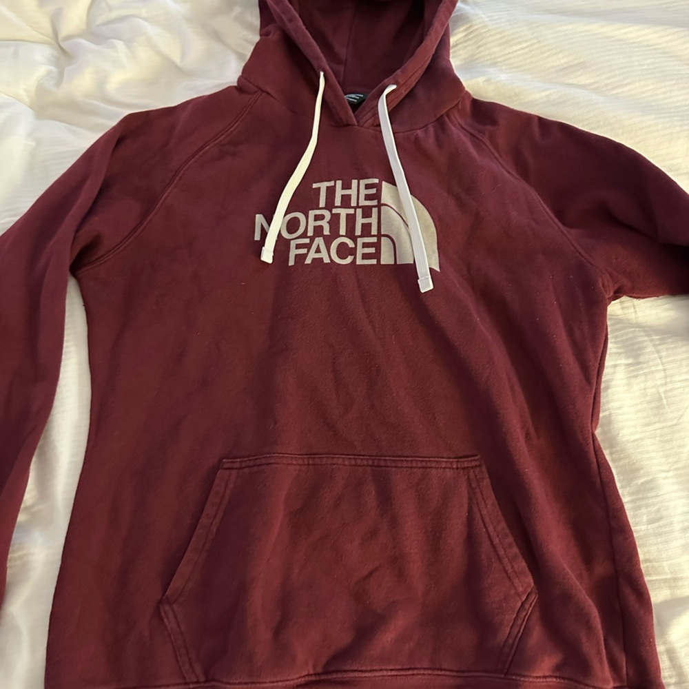 The North Face large burgundy hoodie.